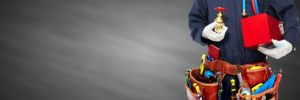 plumber with tools in hand